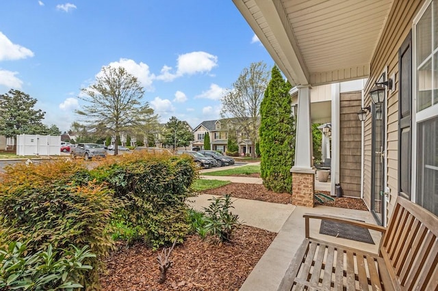 284 Meigs Dr Unit C21, Murfreesboro, TN 37128 - view of yard featuring a porch and a residential view
