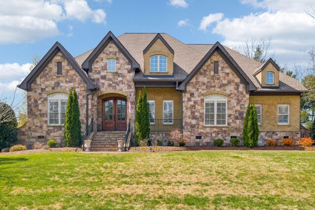1194 Meadow Bridge Ln, Arrington, TN 37014 - view of front of property with french doors, stone siding, a shingled roof, and a front lawn