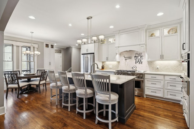 1194 Meadow Bridge Ln, Arrington, TN 37014 - kitchen featuring light countertops, high quality appliances, a sink, and white cabinets