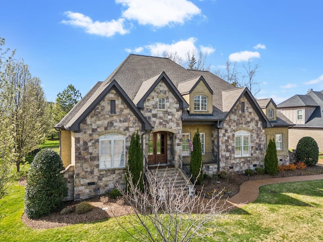 1194 Meadow Bridge Ln, Arrington, TN 37014 - french country inspired facade featuring stone siding, a front yard, crawl space, and a shingled roof