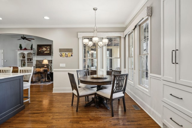 1194 Meadow Bridge Ln, Arrington, TN 37014 - dining space featuring dark wood-style flooring, visible vents, crown molding, recessed lighting, and ceiling fan with notable chandelier