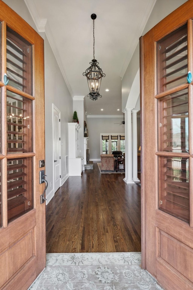 1194 Meadow Bridge Ln, Arrington, TN 37014 - foyer entrance featuring ornate columns, ornamental molding, baseboards, a notable chandelier, and wood finished floors