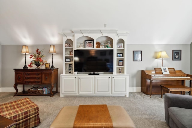 1194 Meadow Bridge Ln, Arrington, TN 37014 - living area with baseboards, lofted ceiling, and light colored carpet