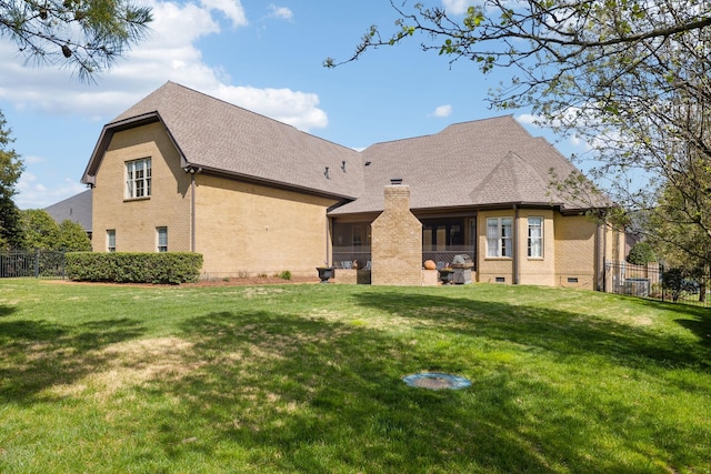 1194 Meadow Bridge Ln, Arrington, TN 37014 - rear view of house featuring roof with shingles, a chimney, fence, brick siding, and a lawn