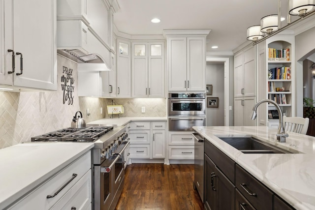 1194 Meadow Bridge Ln, Arrington, TN 37014 - kitchen featuring custom exhaust hood, appliances with stainless steel finishes, white cabinetry, a sink, and a warming drawer