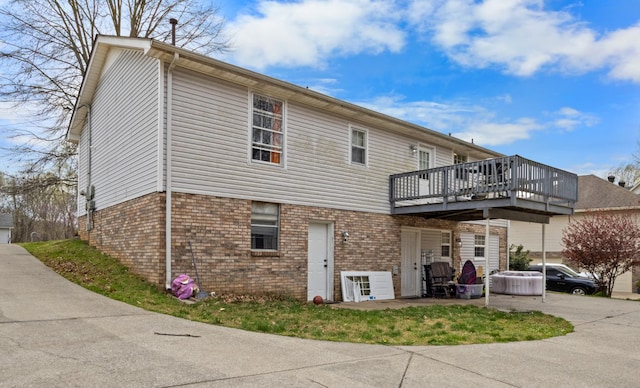 740 Acorn Dr, Clarksville, TN 37043 - back of property featuring brick siding and a deck