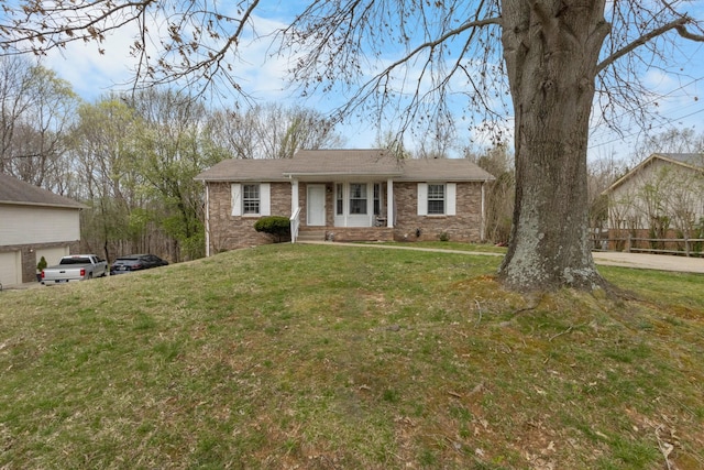 740 Acorn Dr, Clarksville, TN 37043 - single story home featuring brick siding, a garage, and a front lawn