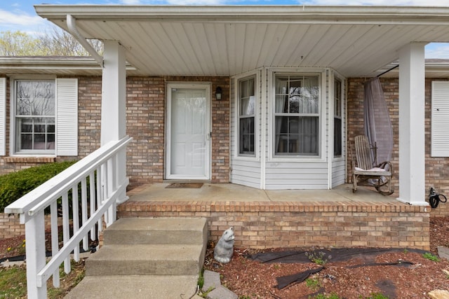740 Acorn Dr, Clarksville, TN 37043 - property entrance featuring brick siding and a porch