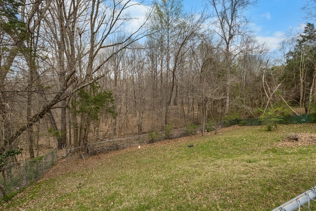740 Acorn Dr, Clarksville, TN 37043 - view of yard featuring a wooded view and fence