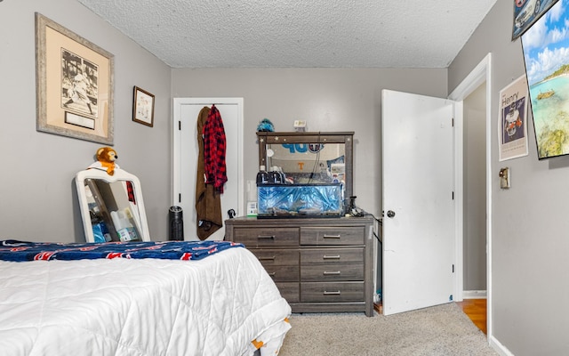 740 Acorn Dr, Clarksville, TN 37043 - carpeted bedroom with a textured ceiling