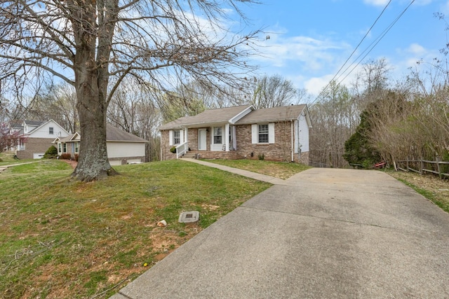 740 Acorn Dr, Clarksville, TN 37043 - view of front of home featuring driveway and a front lawn