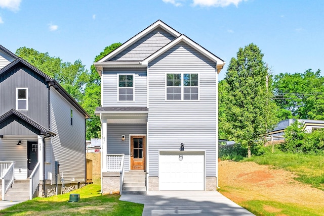 837 Cumberland Dr, Clarksville, TN 37040 - craftsman-style house featuring driveway, a front lawn, and a garage