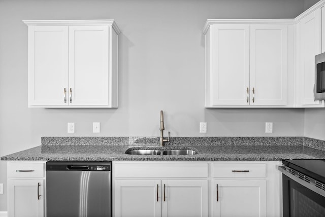 837 Cumberland Dr, Clarksville, TN 37040 - kitchen featuring a sink, stainless steel appliances, and white cabinetry
