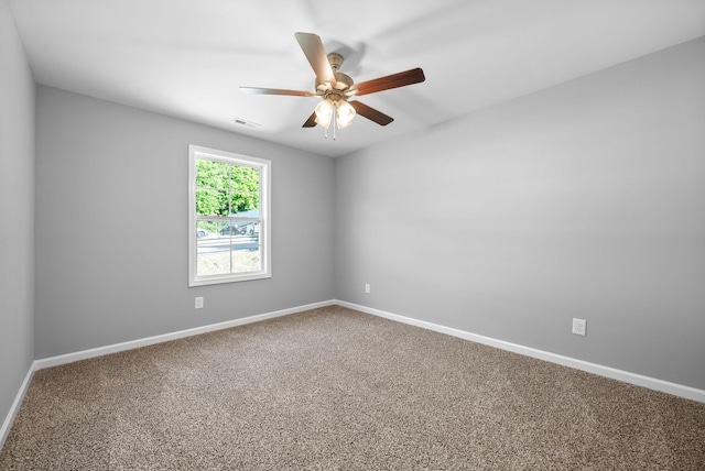 837 Cumberland Dr, Clarksville, TN 37040 - spare room featuring carpet floors, ceiling fan, and baseboards
