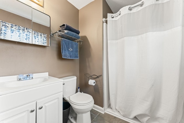bathroom with a shower with curtain, tile patterned flooring, vanity, toilet, and baseboards