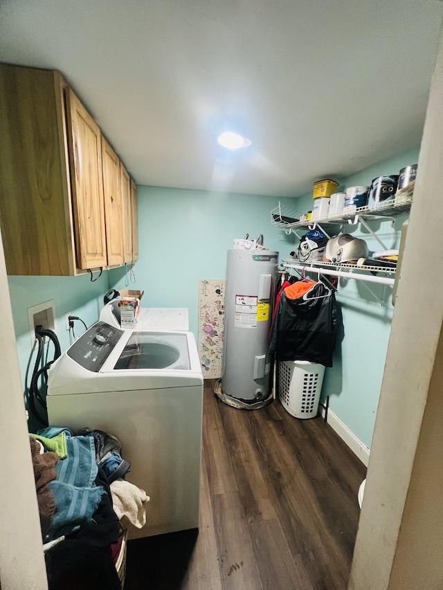 laundry area with water heater, cabinet space, washing machine and dryer, and dark wood-style floors