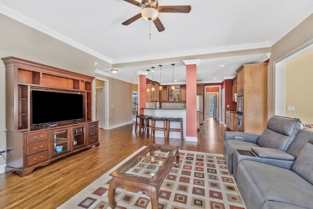 1531 Pumpkin Ridge Ct, Nolensville, TN 37135 - living room featuring baseboards, ornamental molding, wood finished floors, and a ceiling fan