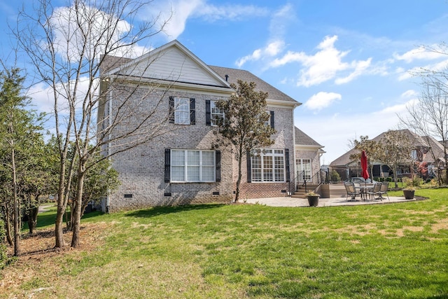 1531 Pumpkin Ridge Ct, Nolensville, TN 37135 - back of house with crawl space, a patio, brick siding, and a lawn