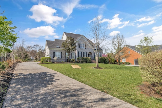 1531 Pumpkin Ridge Ct, Nolensville, TN 37135 - view of front of house with brick siding, concrete driveway, and a front lawn
