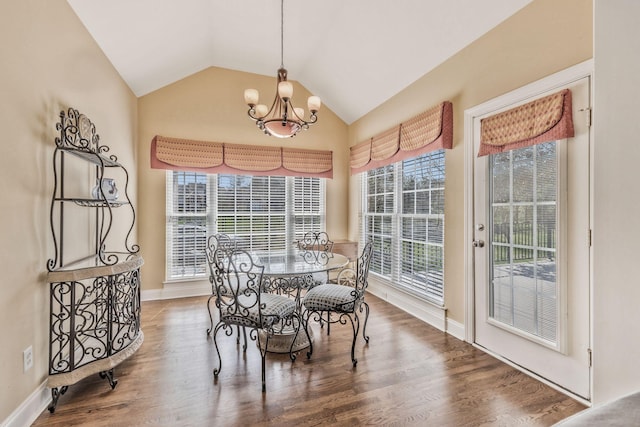 1531 Pumpkin Ridge Ct, Nolensville, TN 37135 - dining area featuring baseboards, lofted ceiling, wood finished floors, and an inviting chandelier