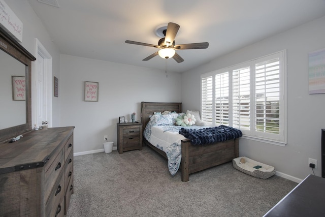 bedroom with carpet, baseboards, and ceiling fan