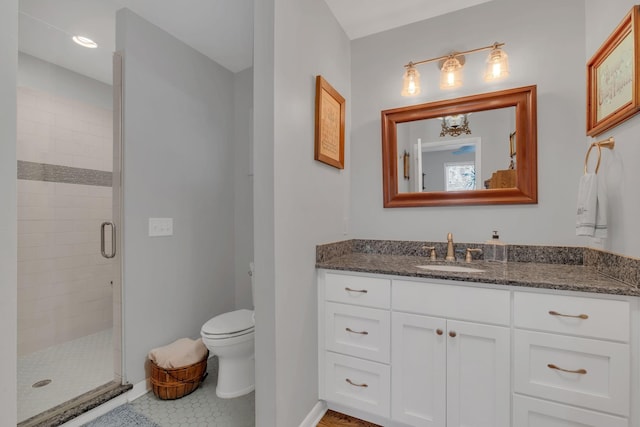 4337 Morriswood Dr, Nashville, TN 37204 - bathroom featuring a stall shower, vanity, toilet, baseboards, and tile patterned floors