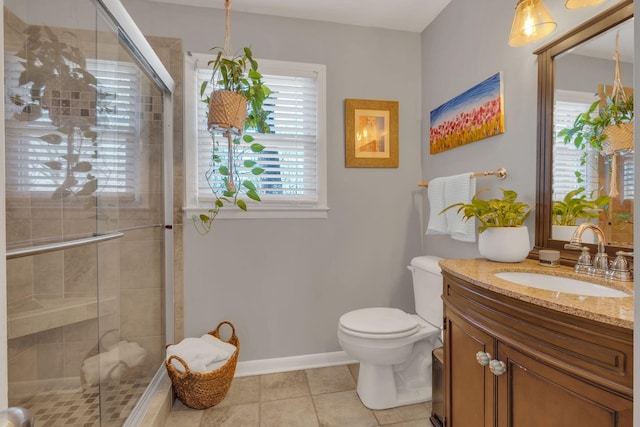 4337 Morriswood Dr, Nashville, TN 37204 - full bathroom with toilet, vanity, a shower stall, tile patterned floors, and baseboards