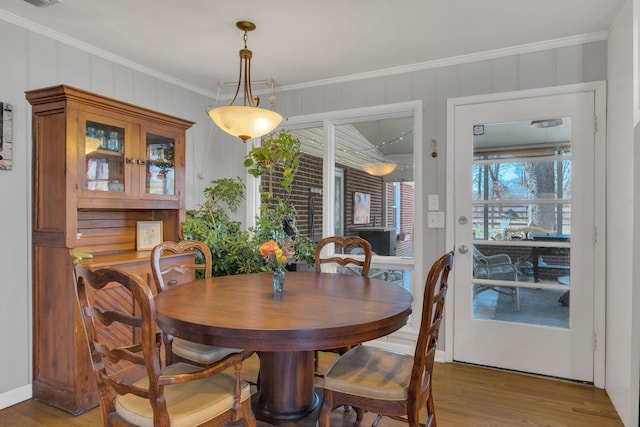 4337 Morriswood Dr, Nashville, TN 37204 - dining area with light wood finished floors and ornamental molding