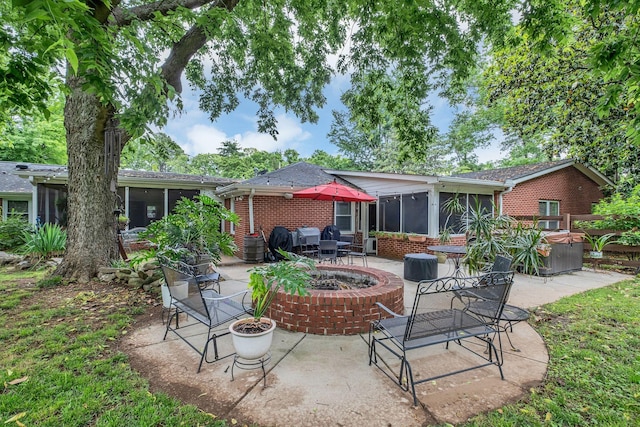 4337 Morriswood Dr, Nashville, TN 37204 - view of patio with a sunroom and a fire pit