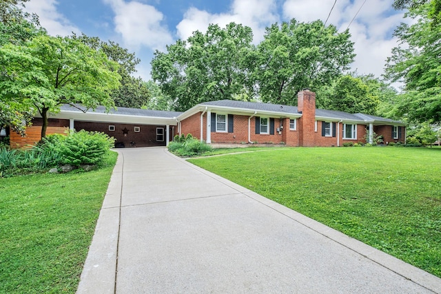 4337 Morriswood Dr, Nashville, TN 37204 - ranch-style house with concrete driveway, brick siding, a chimney, and a front yard