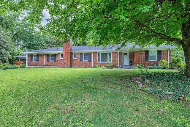 4337 Morriswood Dr, Nashville, TN 37204 - ranch-style house featuring a chimney, a front lawn, and brick siding