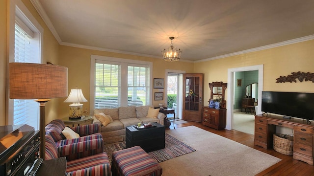 1385 Mitchell St, Celina, TN 38551 - living area featuring ornamental molding, dark wood-type flooring, and a chandelier