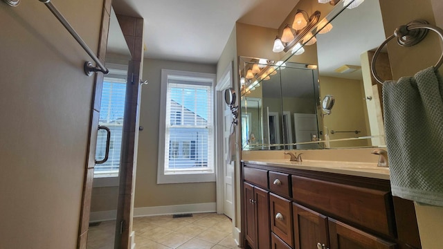 1385 Mitchell St, Celina, TN 38551 - full bath featuring tile patterned floors, a sink, a shower with door, baseboards, and double vanity
