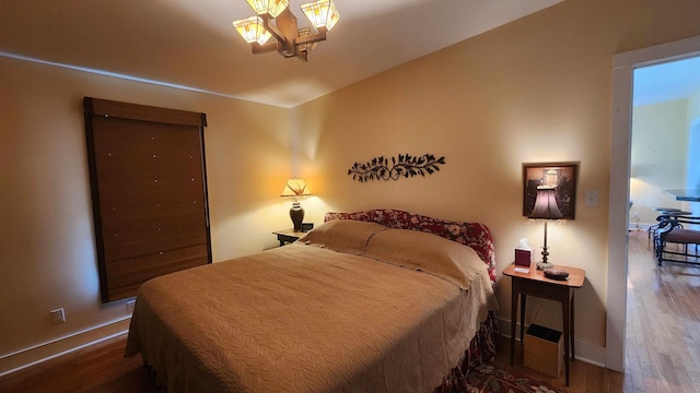 1385 Mitchell St, Celina, TN 38551 - bedroom featuring baseboards and wood finished floors