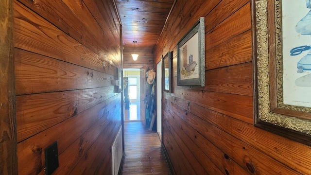 1385 Mitchell St, Celina, TN 38551 - corridor with visible vents, wood walls, and wood ceiling