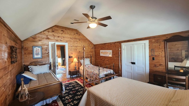 1385 Mitchell St, Celina, TN 38551 - bedroom with lofted ceiling, a ceiling fan, visible vents, and wooden walls