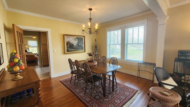 1385 Mitchell St, Celina, TN 38551 - dining area featuring decorative columns, crown molding, and wood finished floors