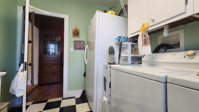 1385 Mitchell St, Celina, TN 38551 - laundry room with baseboards, cabinet space, tile patterned floors, and washer and dryer