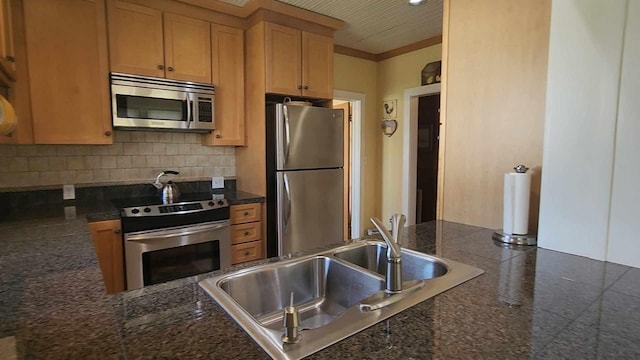 1385 Mitchell St, Celina, TN 38551 - kitchen featuring a sink, tasteful backsplash, and appliances with stainless steel finishes