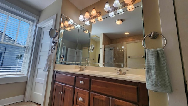 1385 Mitchell St, Celina, TN 38551 - bathroom featuring a stall shower, a sink, tile patterned flooring, baseboards, and double vanity