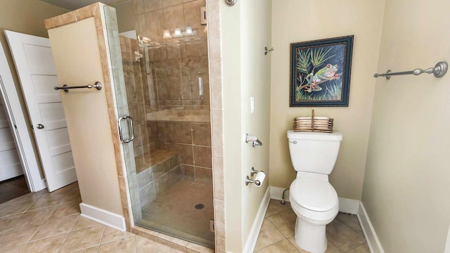 1385 Mitchell St, Celina, TN 38551 - full bath featuring a stall shower, tile patterned floors, toilet, and baseboards
