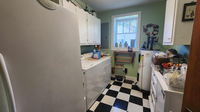 1385 Mitchell St, Celina, TN 38551 - laundry area with water heater, cabinet space, washer and clothes dryer, and light floors