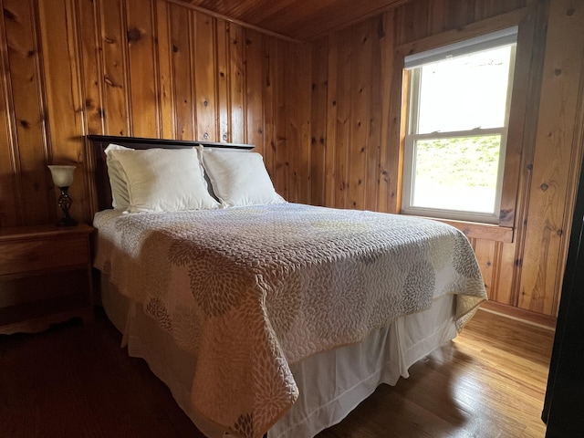 764 Cedar Hill Rd, Celina, TN 38551 - bedroom featuring wood walls and wood finished floors