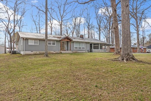 single story home featuring a sunroom, a chimney, a front lawn, and crawl space