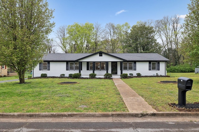 single story home with a front lawn