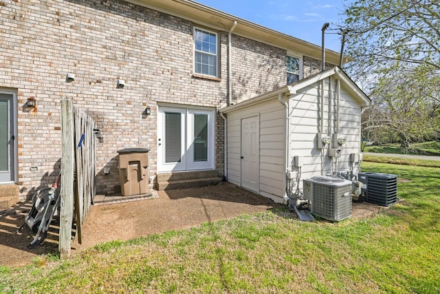 115 Northcrest Ct, Nashville, TN 37211 - back of property featuring a lawn, french doors, and central AC
