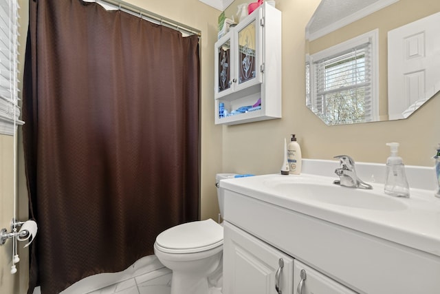 full bathroom featuring crown molding, marble finish floor, toilet, vanity, and a shower with curtain