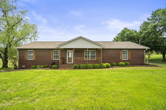 117 Rolling Meadows Ave, Portland, TN 37148 - ranch-style house featuring covered porch, a front lawn, and brick siding