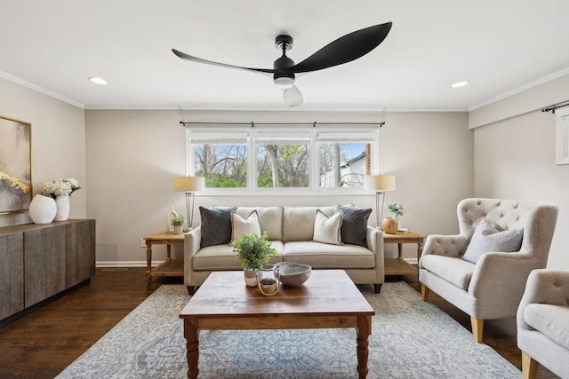 living room with baseboards, ornamental molding, ceiling fan, recessed lighting, and dark wood-type flooring