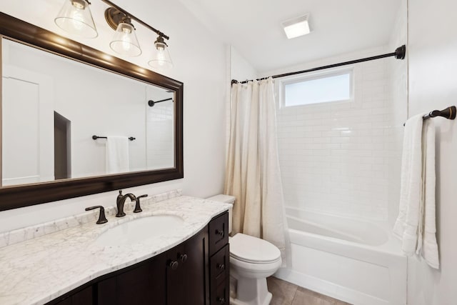 bathroom featuring shower / tub combo with curtain, toilet, and vanity